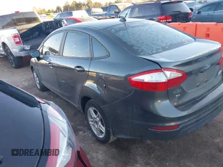 2018 Ford Fiesta SE with VIN 3FADP4BJ4JM111942, listed as a IAAI auction lot 41422060 with 107,041 mi miles and . Bid and sale history available at DreamBid. Image 3.
