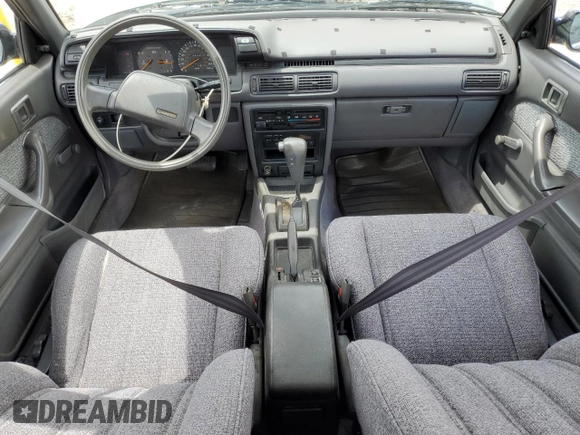 1990 Toyota Camry z VIN JT2VV21E2L0114723, wystawiony jako Copart lot #53584755 z przebiegiem 58 986 mil mil oraz Czysty tytuł • Clean title. Historia ofert i sprzedaży dostępna na DreamBid. Obrazek 8.