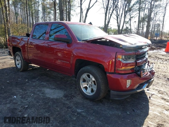 2018 Chevrolet Silverado 1500 LT with VIN 3GCUKREC4JG204672, listed as a IAAI auction lot 41638941 with 134,506 mi miles. Bid and sale history available at carsss.com. Image 1.