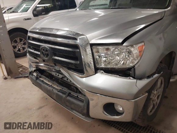 2011 Toyota Tundra 4WD Truck with VIN 5TFDW5F16BX187753, listed as a IAAI auction lot 42003416 with 239,476 mi miles. Bid and sale history available at carsss.com. Image 6.