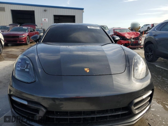 2021 Porsche Panamera с VIN WP0AJ2A75ML116047, выставлен на аукционе Copart как лот 48118405 с пробегом 41 823 миль миль и Чистый • Clean title. История ставок и продаж доступна на DreamBid. Изображение 5.