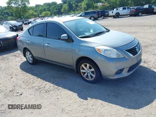 2012 Nissan Versa SV with VIN 3N1CN7AP2CL945917, listed as a IAAI auction lot 42608281 with 142,592 mi miles and . Bid and sale history available at DreamBid. Image 1.