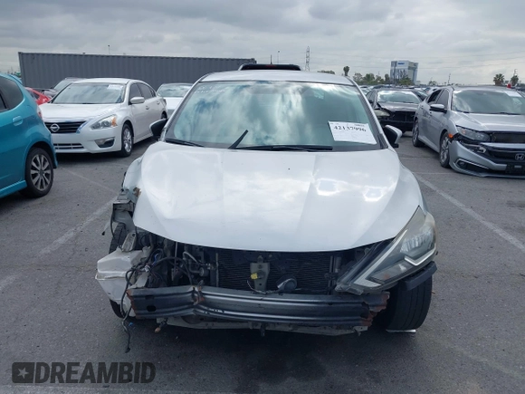 2019 Nissan Sentra S with VIN 3N1AB7APXKY288818, listed as a IAAI auction lot 42137996 with 90,739 mi miles and . Bid and sale history available at DreamBid. Image 13.