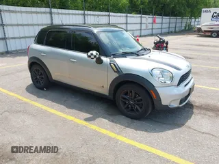 2012 MINI Countryman S z VIN WMWZC5C54CWM13119, wystawiony jako IAAI lot #42467904 z przebiegiem 115 531 mil mil oraz . Historia ofert i sprzedaży dostępna na DreamBid. Obrazek 1.