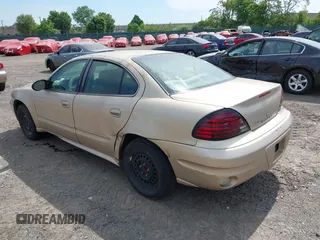 2004 Pontiac Grand Am SE z VIN 1G2NE52F64C108508, wystawiony jako IAAI lot #42143643 z przebiegiem 126 693 mil mil oraz . Historia ofert i sprzedaży dostępna na DreamBid. Obrazek 3.