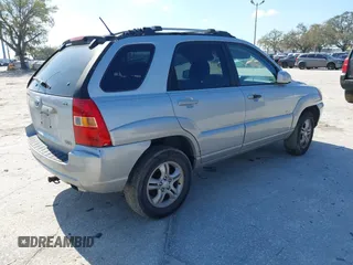 2005 Kia Sportage LX with VIN KNDJE723957128130, listed as a IAAI auction lot 41646193 with 188,142 mi miles and . Bid and sale history available at carsss.com. Image 4.