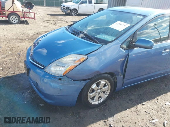 2006 Toyota Prius with VIN JTDKB20U167073069, listed as a IAAI auction lot 41886556 with 122,945 mi miles. Bid and sale history available at carsss.com. Image 6.