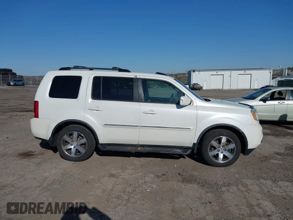 2012 Honda Pilot Touring with VIN 5FNYF4H98CB057659, listed as a IAAI auction lot 41927990 with 140,000 mi miles. Bid and sale history available at carsss.com. Image 13.