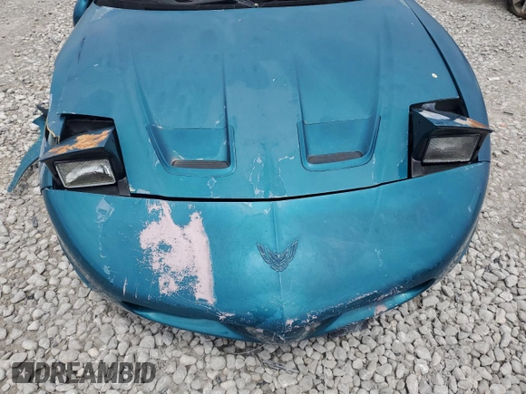 1995 Pontiac Firebird Firebird z VIN 2G2FS22S6S2237631, wystawiony jako Copart lot #61542625 z przebiegiem Nie podano mil oraz Szkoda całkowita • Salvage title. Historia ofert i sprzedaży dostępna na DreamBid. Obrazek 11.