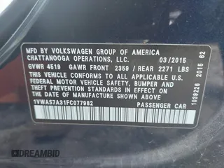 2015 Volkswagen Passat S with VIN 1VWAS7A31FC077982, listed as a IAAI auction lot 42549657 with 64,543 mi miles and . Bid and sale history available at DreamBid. Image 9.