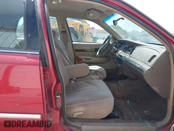 1999 Mercury Grand Marquis GS z VIN 2MEFM74W2XX635561, wystawiony jako IAAI lot #41982451 z przebiegiem 233 137 mil mil oraz . Historia ofert i sprzedaży dostępna na DreamBid. Obrazek 5.