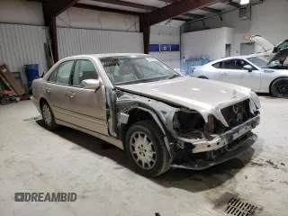 2001 Mercedes-Benz E-Class AWD with VIN WDBJF82J71X043474, listed as a Copart auction lot 45512025 with 59,571 mi miles and Salvage Title. Bid and sale history available at carsss.com. Image 4.