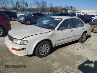 1997 Nissan Maxima GXE с VIN JN1CA21D2VT809452, выставлен на аукционе Copart как лот 85477434 с пробегом 154 163 миль миль и Списание • Salvage title. История ставок и продаж доступна на DreamBid. Изображение 1.
