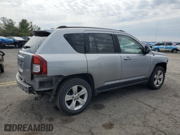 2014 Jeep Compass Latitude with VIN 1C4NJDEB4ED788348, listed as a Copart auction lot 52885935 with 86,282 mi miles and Salvage Title. Bid and sale history available at DreamBid. Image 3.