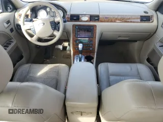2006 Ford Five Hundred Limited with VIN 1FAHP28176G152533, listed as a Copart auction lot 57301935 with 242,981 mi miles and Salvage title. Bid and sale history available at DreamBid. Image 8.