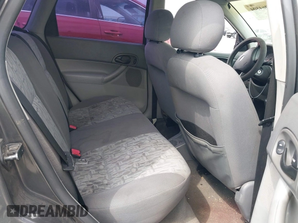 2005 Ford Focus SE with VIN 1FAFP36N65W305152, listed as a IAAI auction lot 42064504 with 280,811 mi miles and . Bid and sale history available at carsss.com. Image 8.