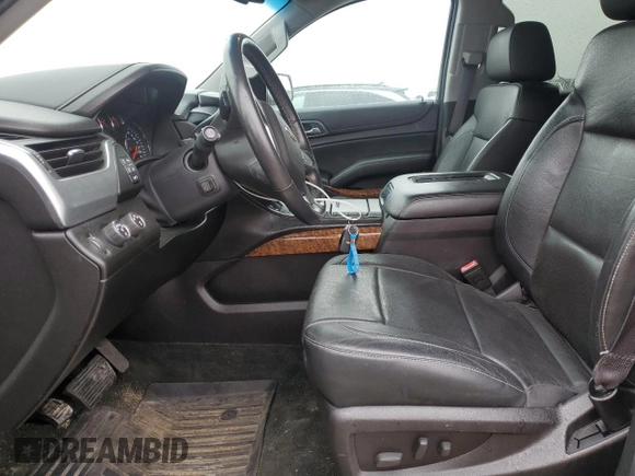 2015 Chevrolet Tahoe LTZ z VIN 1GNSKCKC5FR100084, wystawiony jako Copart lot #57677825 z przebiegiem 141 987 mil mil oraz Czysty tytuł • Clean title. Historia ofert i sprzedaży dostępna na DreamBid. Obrazek 7.