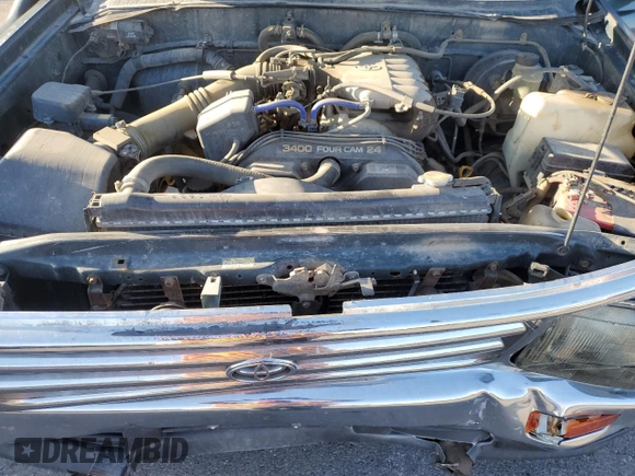 1996 Toyota T100 SR5 z VIN JT4UN24D2T0029466, wystawiony jako Copart lot #57122945 z przebiegiem 421 207 mil mil oraz Szkoda całkowita • Salvage title. Historia ofert i sprzedaży dostępna na DreamBid. Obrazek 11.