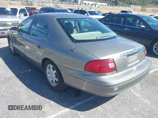 2002 Mercury Sable GS with VIN 1MEFM50U92A613552, listed as a IAAI auction lot 41718804 with 211,661 mi miles. Bid and sale history available at carsss.com. Image 3.