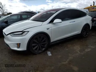 2016 Tesla Model X 70D with VIN 5YJXCAE28GF017100, listed as a Copart auction lot 50081235 with 126,962 mi miles and Salvage Title. Bid and sale history available at DreamBid. Image 1.