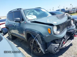 2017 Jeep Renegade Deserthawk z VIN ZACCJBCB1HPG12779, wystawiony jako IAAI lot #41294595 z przebiegiem 92 316 mil mil oraz . Historia ofert i sprzedaży dostępna na DreamBid. Obrazek 1.