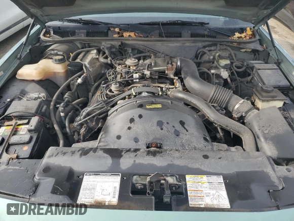 1997 Mercury Grand Marquis GS z VIN 2MELM74W7VX687221, wystawiony jako Copart lot #78665224 z przebiegiem 226 077 mil mil oraz Szkoda całkowita • Salvage title. Historia ofert i sprzedaży dostępna na DreamBid. Obrazek 11.