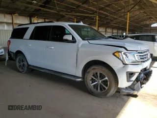 2019 Ford Expedition Max XLT with VIN 1FMJK1JT0KEA29870, listed as a Copart auction lot 57326365 with 92,604 mi miles and Salvage title. Bid and sale history available at DreamBid. Image 4.