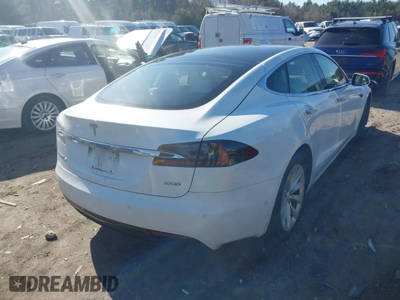 2017 Tesla Model S 100D with VIN 5YJSA1E22HF219352, listed as a IAAI auction lot 41831322 with 97,516 mi miles and . Bid and sale history available at DreamBid. Image 4.
