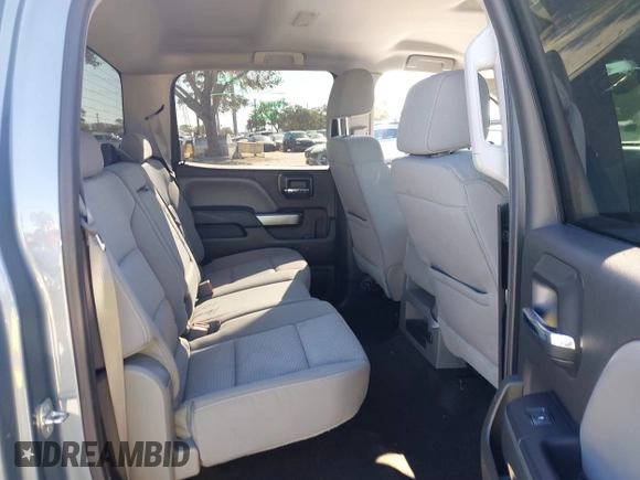 2016 Chevrolet Silverado 1500 LT with VIN 3GCUKREC8GG219524, listed as a IAAI auction lot 41087657 with 123,010 mi miles and . Bid and sale history available at DreamBid. Image 8.