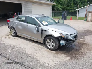 2015 Kia Optima LX with VIN KNAGM4A75F5587648, listed as a IAAI auction lot 42502897 with 149,689 mi miles and . Bid and sale history available at DreamBid. Image 1.