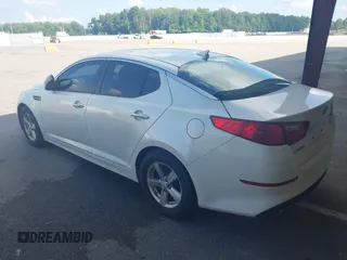 2015 Kia Optima LX with VIN KNAGM4A77F5568339, listed as a IAAI auction lot 42695740 with 135,632 mi miles and . Bid and sale history available at DreamBid. Image 3.