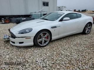 2009 Aston Martin DB9 z VIN SCFAD01E59GA10938, wystawiony jako Copart lot #39463124 z przebiegiem 19 856 mil mil oraz . Historia ofert i sprzedaży dostępna na DreamBid. Obrazek 1.
