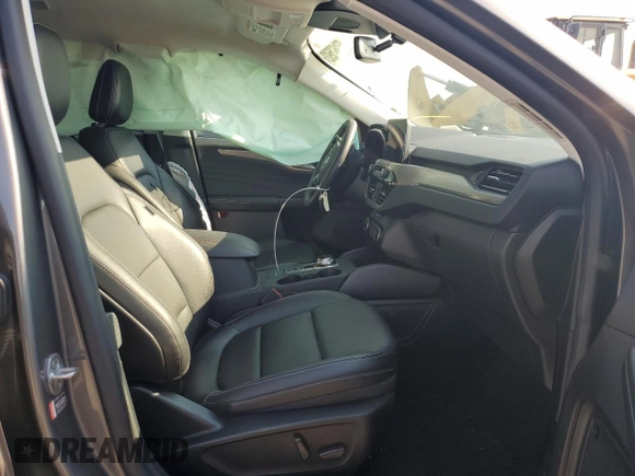 2021 Ford Escape Titanium Plug-In Hybrid z VIN 1FMCU0LZ1MUB17737, wystawiony jako Copart lot #57162592 z przebiegiem Nie podano mil oraz . Historia ofert i sprzedaży dostępna na DreamBid. Obrazek 5.