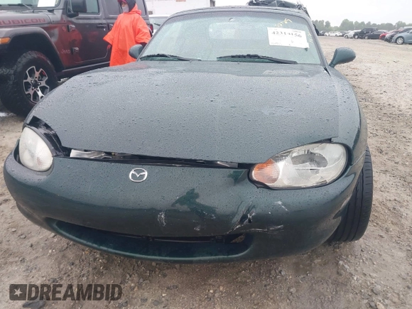 1999 Mazda MX-5 Miata with VIN JM1NB3539X0123231, listed as a IAAI auction lot 42314156 with 154,755 mi miles and . Bid and sale history available at DreamBid. Image 6.