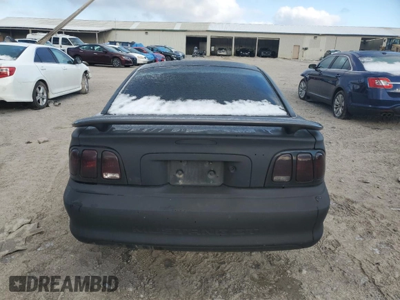 1995 Ford Mustang GT with VIN 1FALP42T2SF181843, listed as a Copart auction lot 46025335 with 65,235 mi miles and Salvage title. Bid and sale history available at DreamBid. Image 6.