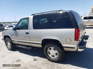 1999 Chevrolet Tahoe with VIN 3GNEK18RXXG190783, listed as a Copart auction lot 52666545 with 240,094 mi miles and Salvage Title. Bid and sale history available at carsss.com. Image 2.
