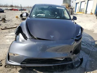 2023 Tesla Model Y Long Range z VIN 7SAYGDEE7PF822934, wystawiony jako Copart lot #49285285 z przebiegiem Nie podano mil oraz Szkoda całkowita • Salvage title. Historia ofert i sprzedaży dostępna na DreamBid. Obrazek 5.