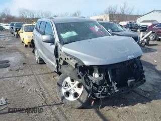 2014 Jeep Grand Cherokee Altitude with VIN 1C4RJFAG2EC219986, listed as a IAAI auction lot 41463264 with 138,518 mi miles. Bid and sale history available at carsss.com. Image 1.