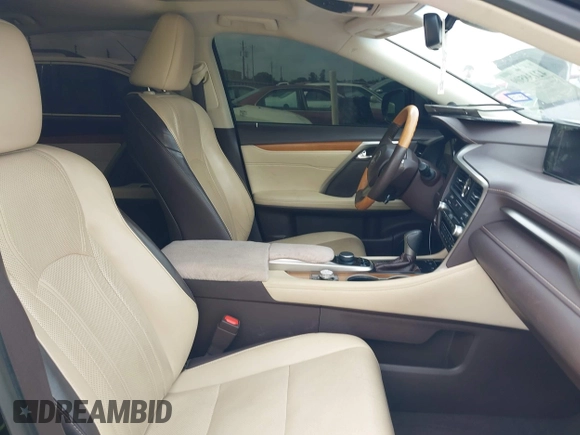 2018 Lexus RX 350 z VIN 2T2ZZMCA1JC103844, wystawiony jako IAAI lot #42138509 z przebiegiem 118 754 mil mil oraz . Historia ofert i sprzedaży dostępna na DreamBid. Obrazek 5.
