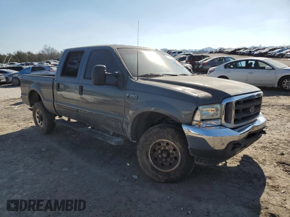 2002 Ford F-250 XL with VIN 3FTNW20F92MA15309, listed as a Copart auction lot 43750155 with 233,290 mi miles and Salvage Title. Bid and sale history available at DreamBid. Image 4.