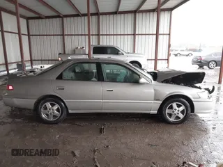 2001 Toyota Camry CE z VIN JT2BG22K410544168, wystawiony jako IAAI lot #42201412 z przebiegiem 158 500 mil mil oraz . Historia ofert i sprzedaży dostępna na DreamBid. Obrazek 13.