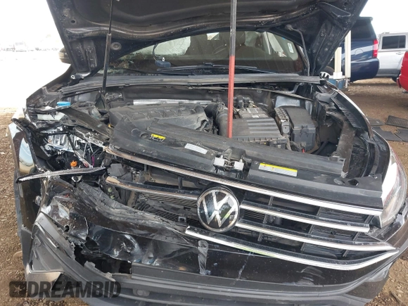 2022 Volkswagen Tiguan SE with VIN 3VV3B7AX4NM109997, listed as a IAAI auction lot 41906297 with 62,692 mi miles and . Bid and sale history available at DreamBid. Image 10.