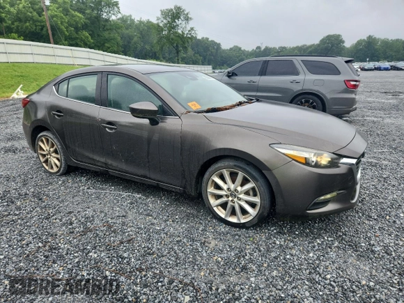 2017 Mazda 3 Touring z VIN 3MZBN1V70HM112387, wystawiony jako Copart lot #59580965 z przebiegiem 109 799 mil mil oraz Czysty tytuł • Clean title. Historia ofert i sprzedaży dostępna na DreamBid. Obrazek 4.