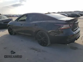 2020 Nissan Maxima SR with VIN 1N4AA6EVXLC366646, listed as a Copart auction lot 44740745 with 104,100 mi miles and Salvage Title. Bid and sale history available at DreamBid. Image 2.