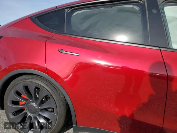2024 Tesla Model Y Performance z VIN 7SAYGDEF7RF128112, wystawiony jako Copart lot #85596764 z przebiegiem Nie podano mil oraz Szkoda całkowita • Salvage title. Historia ofert i sprzedaży dostępna na DreamBid. Obrazek 11.