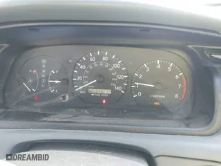 2000 Toyota Camry CE with VIN 4T1BG22KXYU730531, listed as a IAAI auction lot 42003342 with 248,235 mi miles. Bid and sale history available at carsss.com. Image 7.