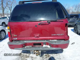 2004 Chevrolet Suburban Z71 with VIN 3GNFK16Z84G231091, listed as a IAAI auction lot 41595885 with 101,243 mi miles. Bid and sale history available at carsss.com. Image 16.
