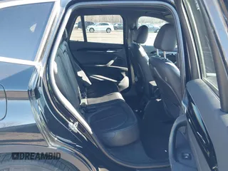 2018 BMW X1 xDrive28i with VIN WBXHT3C36J5F91110, listed as a IAAI auction lot 41757293 with 80,327 mi miles. Bid and sale history available at carsss.com. Image 8.
