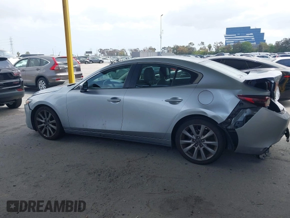 2020 Mazda 3 Select with VIN 3MZBPACL6LM131481, listed as a IAAI auction lot 42118795 with 104,102 mi miles and . Bid and sale history available at DreamBid. Image 14.