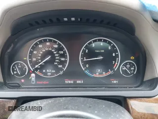 2013 BMW 7 Series 750Li xDrive with VIN WBAYF8C56DD140816, listed as a IAAI auction lot 41709920 with 157,842 mi miles and . Bid and sale history available at DreamBid. Image 7.